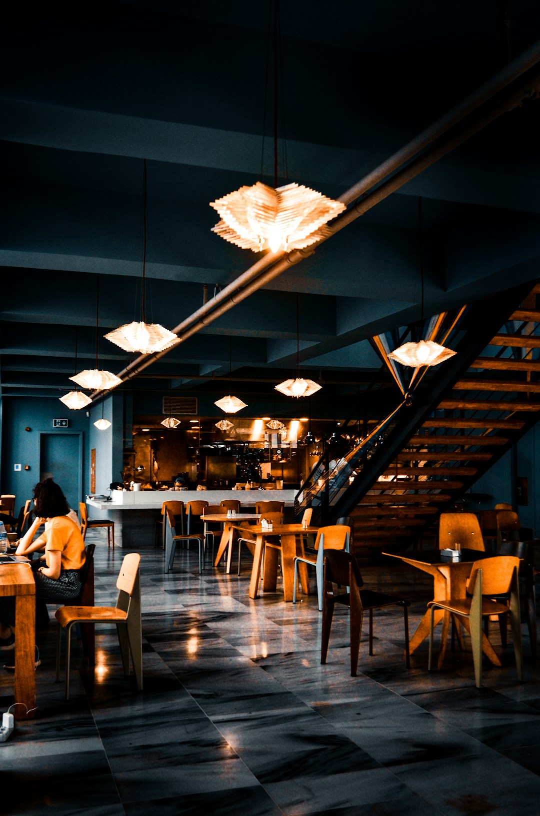 people-sitting-on-chairs-inside-restaurant-1h30urc1plc